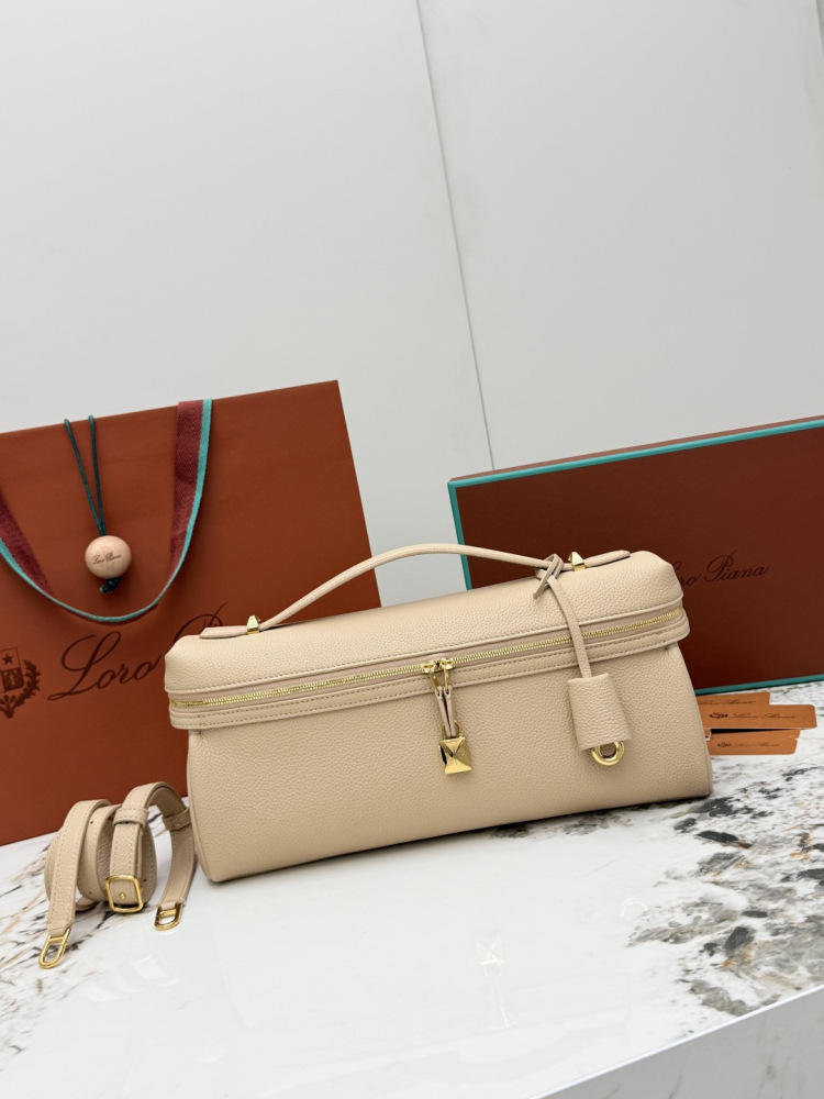 Loro Piana Extra Pocket L19 handbag, crafted in milk tea beige grained leather with gold-tone hardware.
