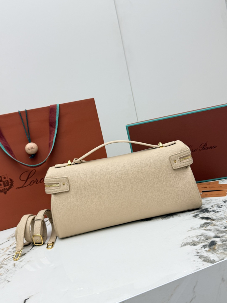Loro Piana Extra Pocket L19 handbag, crafted in milk tea beige grained leather with gold-tone hardware.