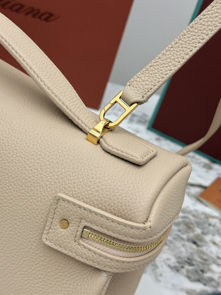 Loro Piana Extra Pocket L19 handbag, crafted in milk tea beige grained leather with gold-tone hardware.