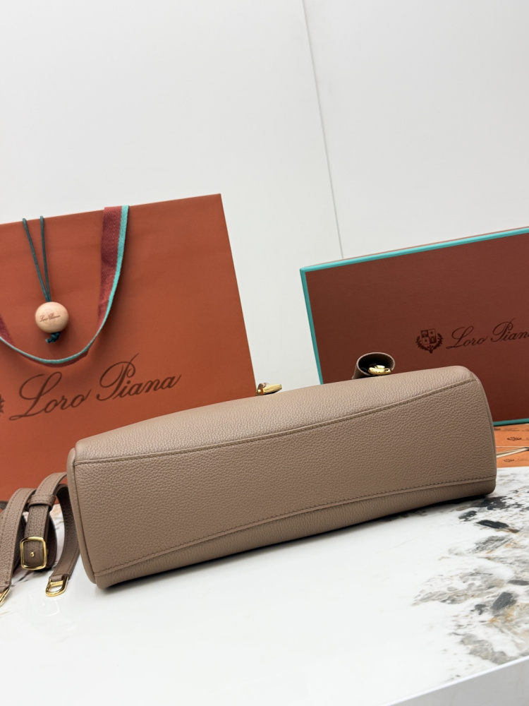 Loro Piana Extra Pocket L19 handbag, crafted in elephant grey grained leather with gold-tone hardware.