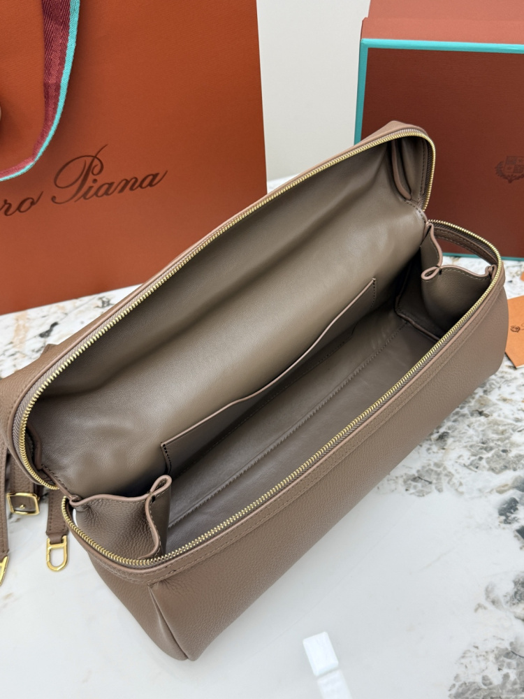 Loro Piana Extra Pocket L19 handbag, crafted in elephant grey grained leather with gold-tone hardware.
