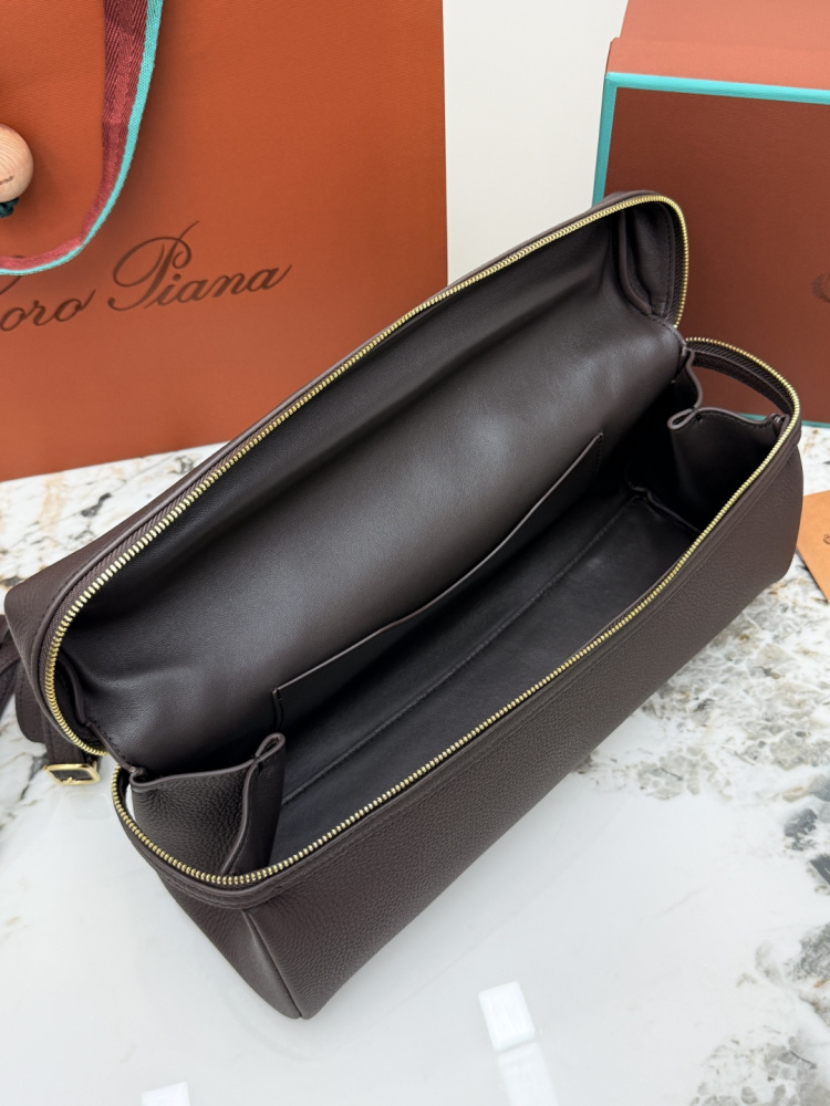 Loro Piana Extra Pocket handbag, crafted in dark brown grained leather with gold-tone hardware.