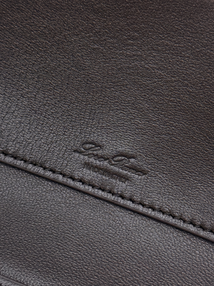 Loro Piana Extra Pocket handbag, crafted in dark brown grained leather with gold-tone hardware.