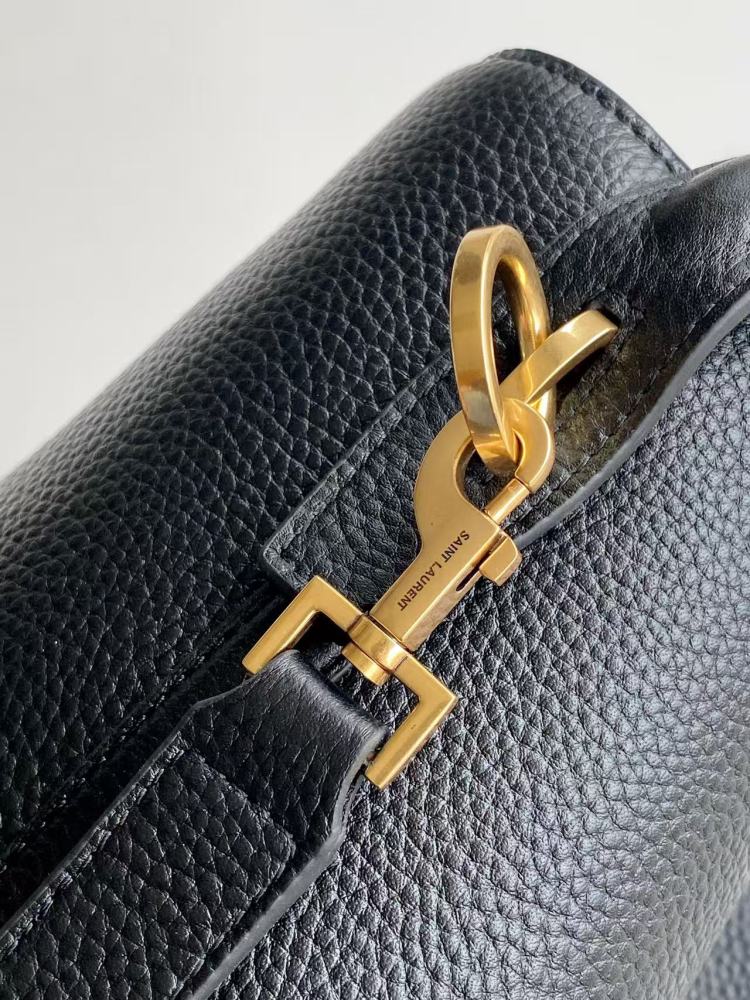 This is a bucket bag from Yves Saint Laurent (YSL), crafted in black grained leather with a gold-tone YSL logo hardware. It comes with a detachable pouch and strap, suitable for both hand-held and crossbody wear.