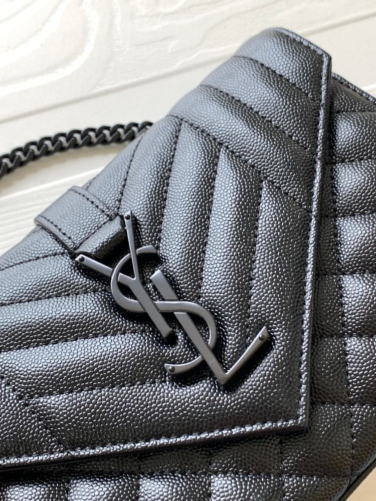 This is a quilted envelope bag from YSL, crafted in black caviar leather with a matching black logo and metal chain strap, suitable for shoulder or crossbody wear.