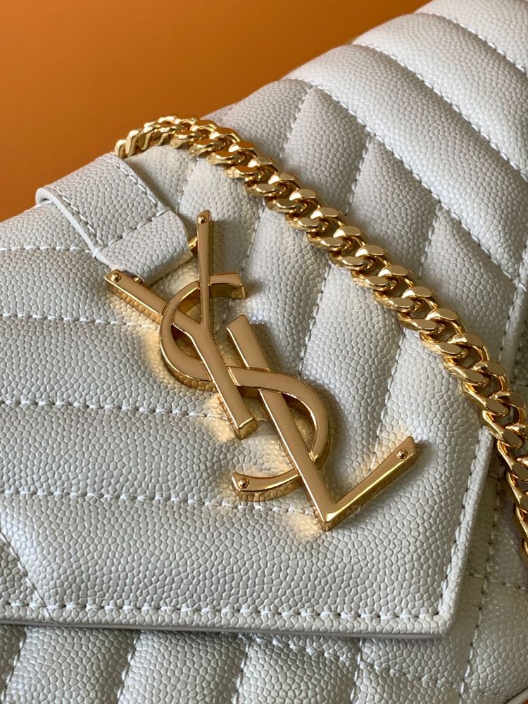 This is a quilted envelope bag from YSL, crafted in off-white caviar leather with a gold-tone logo and metal chain strap, suitable for shoulder or crossbody wear.