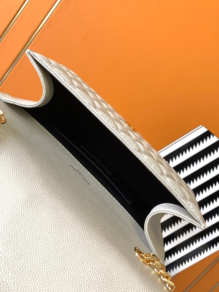 This is a quilted envelope bag from YSL, crafted in off-white caviar leather with a gold-tone logo and metal chain strap, suitable for shoulder or crossbody wear.
