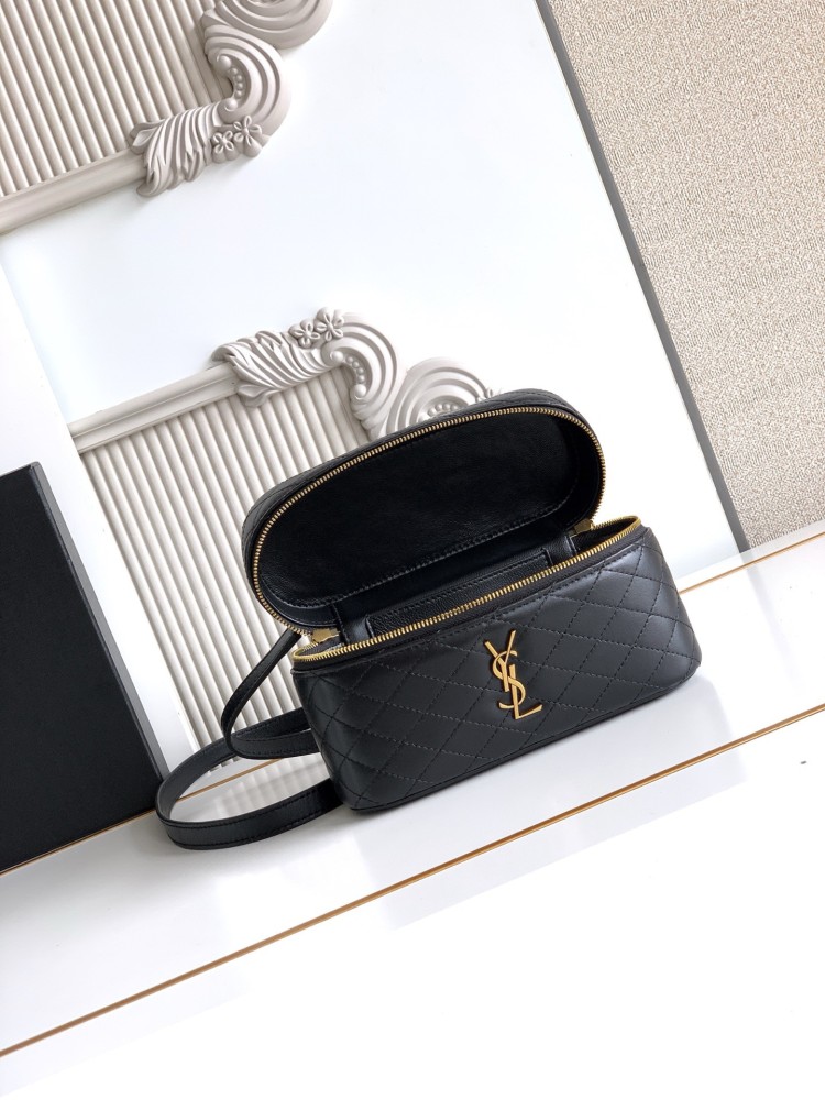 This is a quilted vanity-style handbag from Yves Saint Laurent (YSL), crafted in smooth black leather with a gold-tone brand logo and detachable strap. It exudes an elegant handheld feel and the convenience of shoulder carrying.
