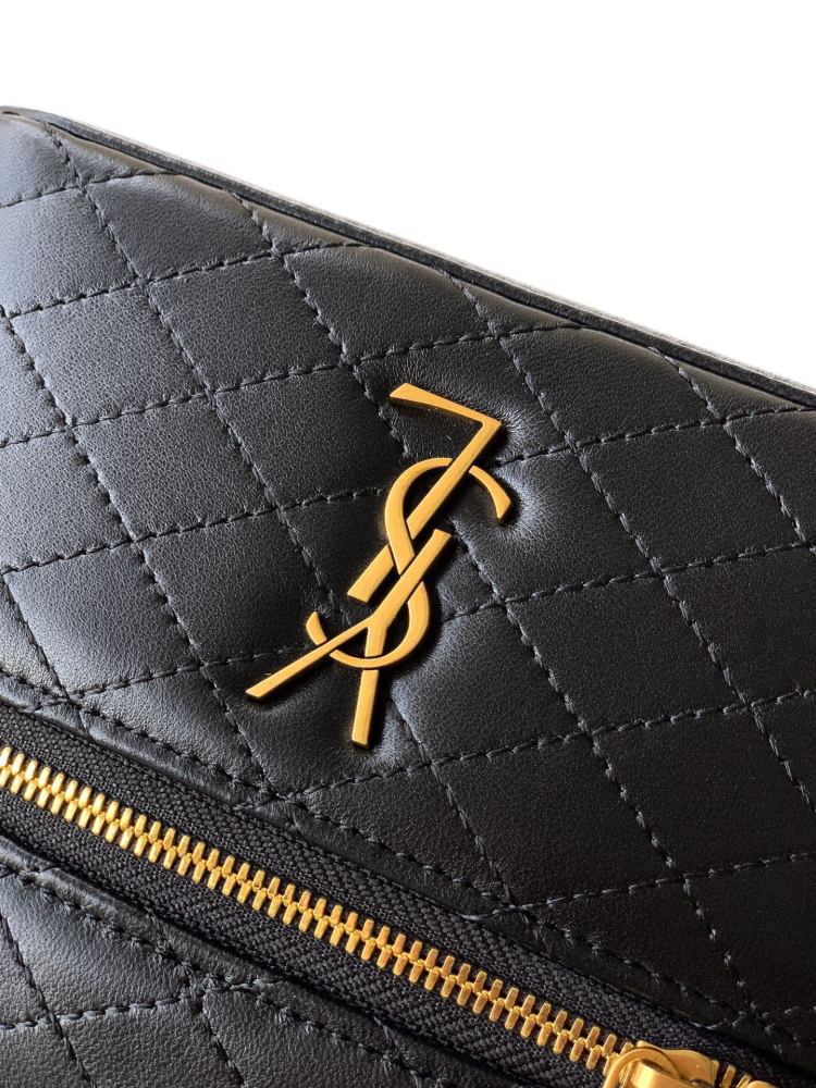 This is a quilted vanity-style handbag from Yves Saint Laurent (YSL), crafted in smooth black leather with a gold-tone brand logo and detachable strap. It exudes an elegant handheld feel and the convenience of shoulder carrying.