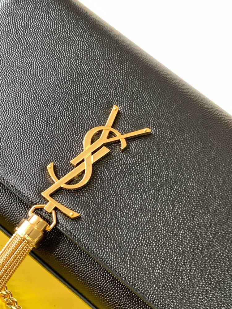 This is the YSL Kate tassel chain bag, made of black caviar leather with gold-tone logo and tassel, suitable for shoulder or crossbody wear.