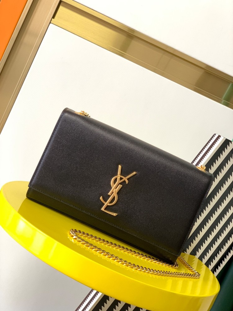 This is the YSL Kate chain bag, crafted in black caviar leather with a gold-tone metal logo and chain strap, no tassel, suitable for shoulder or crossbody wear.