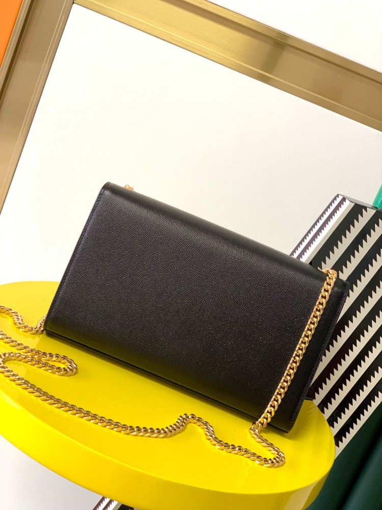 This is the YSL Kate chain bag, crafted in black caviar leather with a gold-tone metal logo and chain strap, no tassel, suitable for shoulder or crossbody wear.