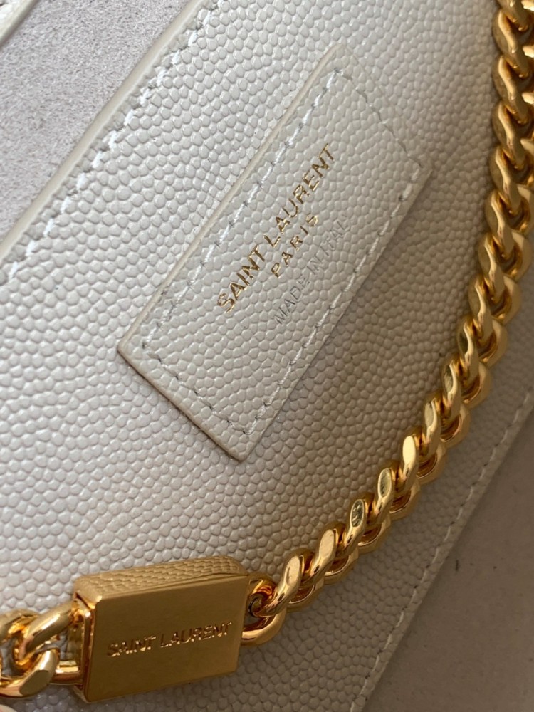 This is the YSL Kate chain bag, made of white caviar leather with gold-tone logo and chain, suitable for shoulder or crossbody wear.