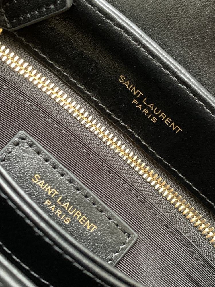 This is the classic YSL (Yves Saint Laurent) Loulou shoulder bag, made of black pebbled leather with gold-tone metal logo and chain.