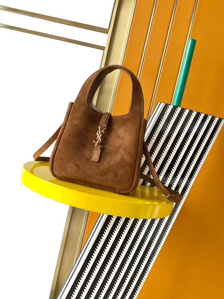 and the iconic gold-tone YSL logo, showcasing a sleek and sophisticated style suitable for both daily and formal occasions.