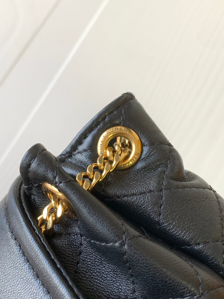 This is a quilted chain bag from YSL (Yves Saint Laurent), crafted from soft black leather with a gold-tone metal YSL logo and chain strap. It features a sleek and sophisticated design, suitable for shoulder or crossbody wear.