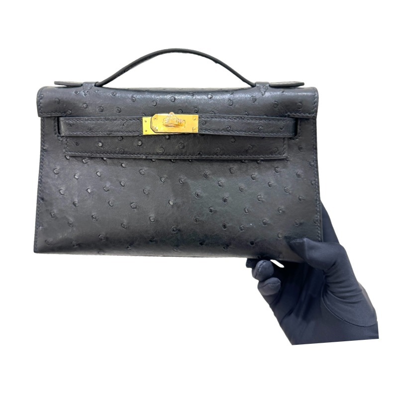 The Hermès Mini Kelly I (also known as the Kelly Pochette) Ostrich Leather Handbag is one of the brand's classic exotic leather models.