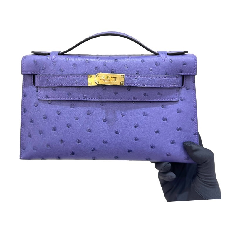 The Hermès Mini Kelly I (also known as the Kelly Pochette) Ostrich Leather Handbag is one of the brand's classic exotic leather models.