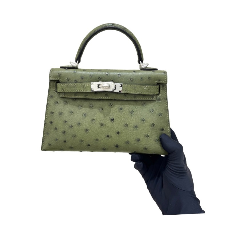 The Hermès Mini Kelly I (also known as the Kelly Pochette) Ostrich Leather Handbag is one of the brand's classic exotic leather models.
