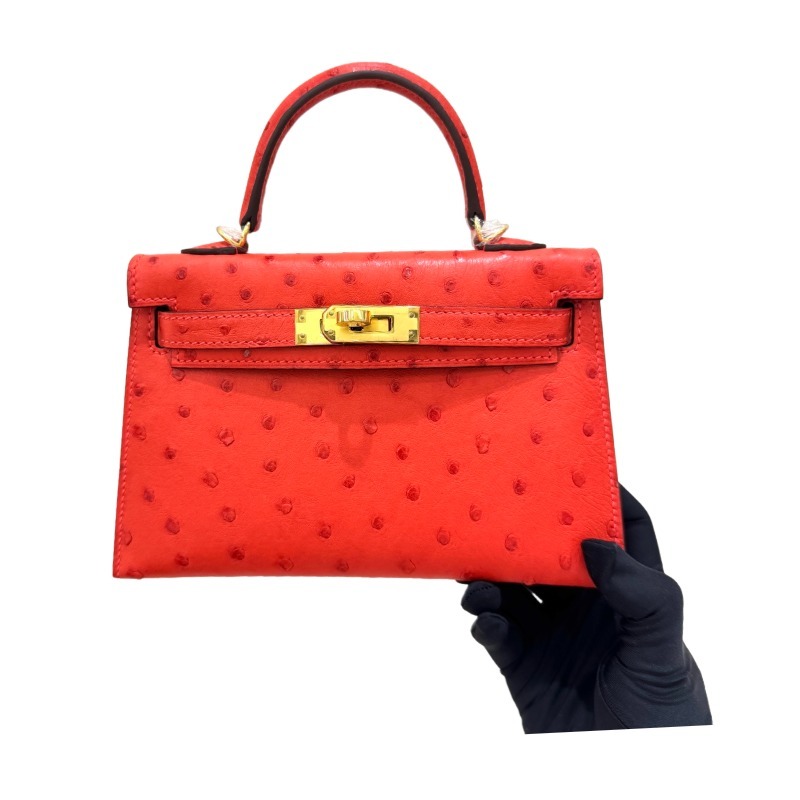 The Hermès Mini Kelly I (also known as the Kelly Pochette) Ostrich Leather Handbag is one of the brand's classic exotic leather models.