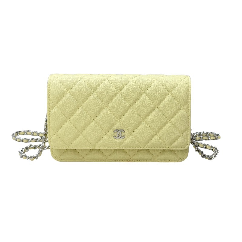 Chanel Wallet on Chain (WOC) crafted in lemon yellow caviar leather with silver-tone hardware.