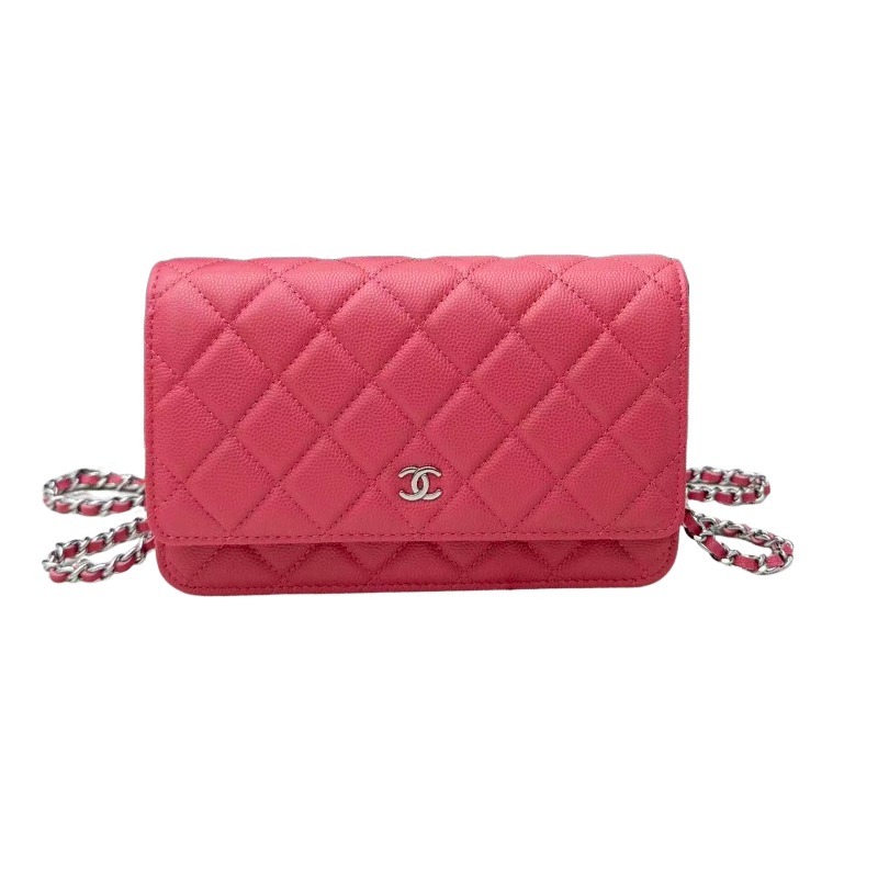Chanel Wallet on Chain (WOC) crafted in rose pink caviar leather with silver-tone hardware.