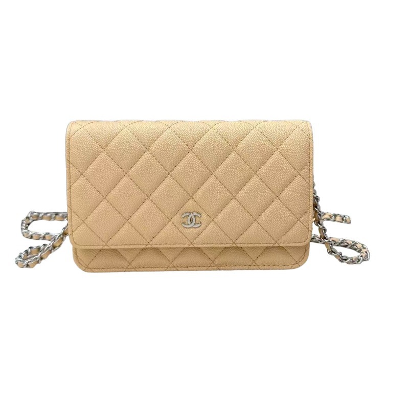 Chanel Wallet on Chain (WOC) crafted in light beige caviar leather with silver-tone hardware.