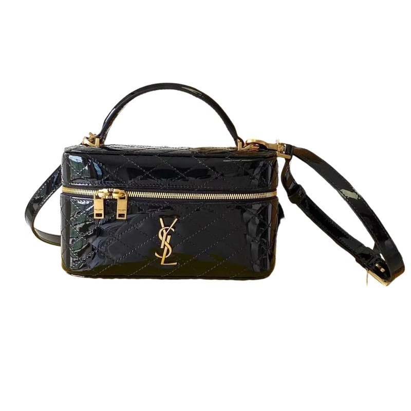 This is a quilted cosmetic bag from YSL, crafted in black patent leather with a gold-tone logo and detachable strap, suitable for hand-held or shoulder wear.