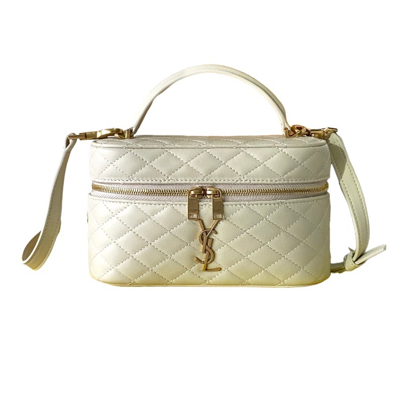 This is a quilted cosmetic bag from YSL, crafted in off-white grained leather with a gold-tone logo and detachable strap, suitable for hand-held or shoulder wear.