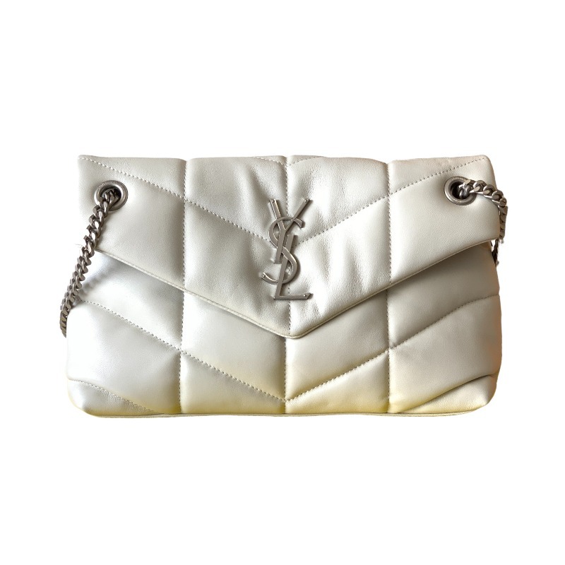 This is the YSL Loulou Puffer quilted bag, crafted from white soft leather with a silver YSL logo, featuring a relaxed yet sophisticated style and suitable for shoulder or crossbody wear.