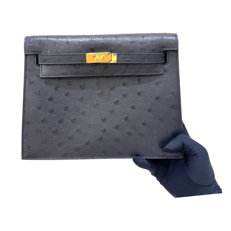 The Hermès Kelly Danse handbag in ostrich leather—featuring a classic black finish paired with gold hardware—stands as a versatile standout within the brand's lineup, offering a perfect blend of practicality and collectible value.
