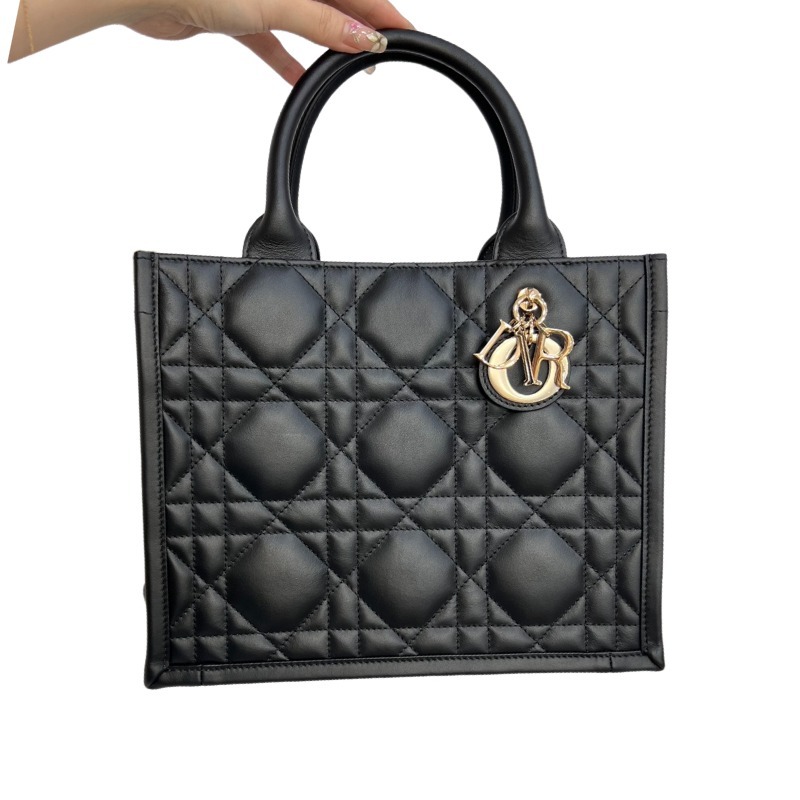 The medium-sized Dior Book Tote in quilted, also known as the "Dior quilted tote bag," is a leather upgrade of the classic Book Tote.