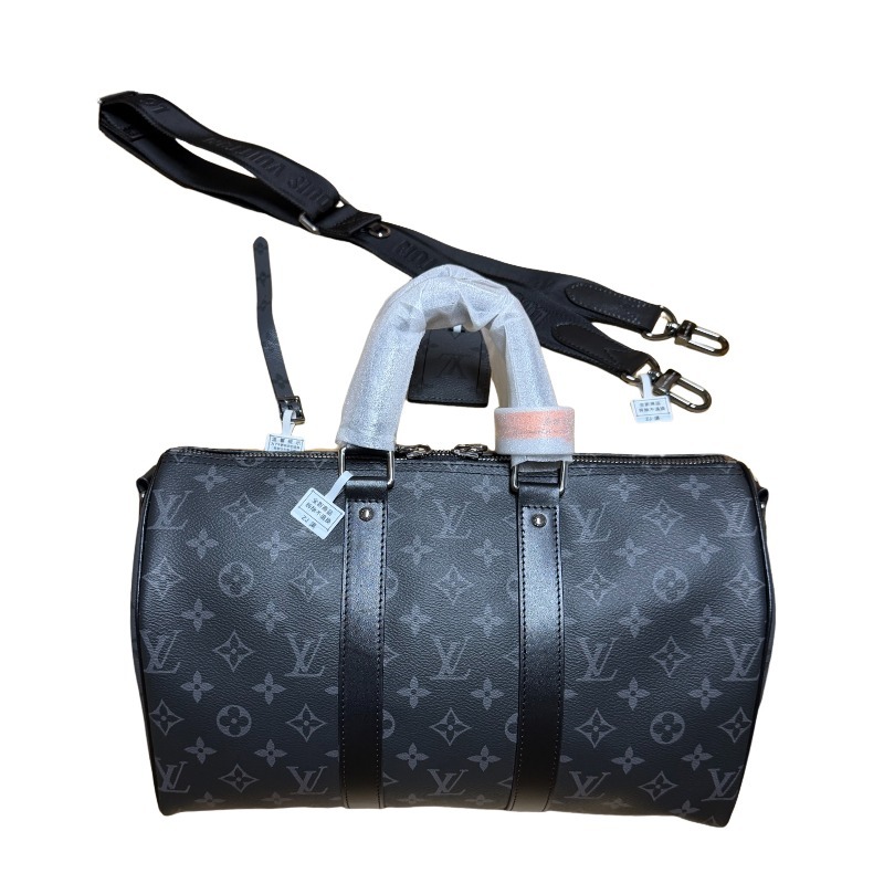 The Louis Vuitton Keepall Bandoulière 35 bag features the classic Monogram Eclipse black and grey canvas.