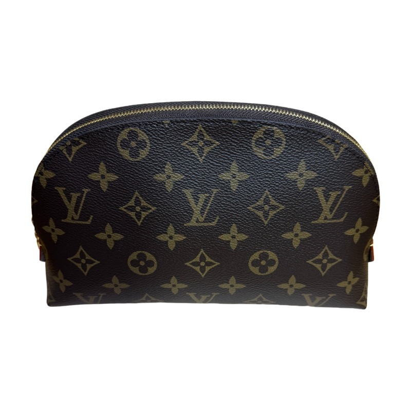 The classic Louis Vuitton Cosmetic Pouch features the brand's iconic Monogram coated canvas.