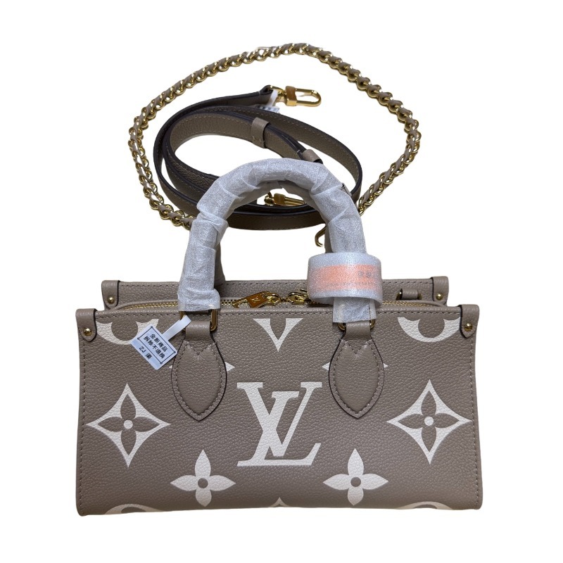 Louis Vuitton OnTheGo East-West Small Handbag, featuring a Grey/White colorway in Monogram Empreinte embossed cowhide.