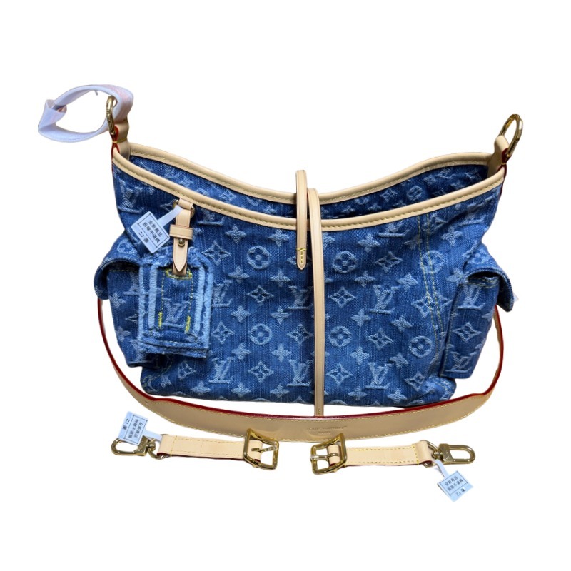 The Louis Vuitton Carryall Denim handbag is a highly sought-after, retro-style shoulder bag that has enjoyed immense popularity in recent years.