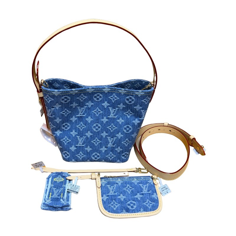 The Louis Vuitton Nano Bucket bag features the Monogram Denim canvas—a highly popular material in recent years.