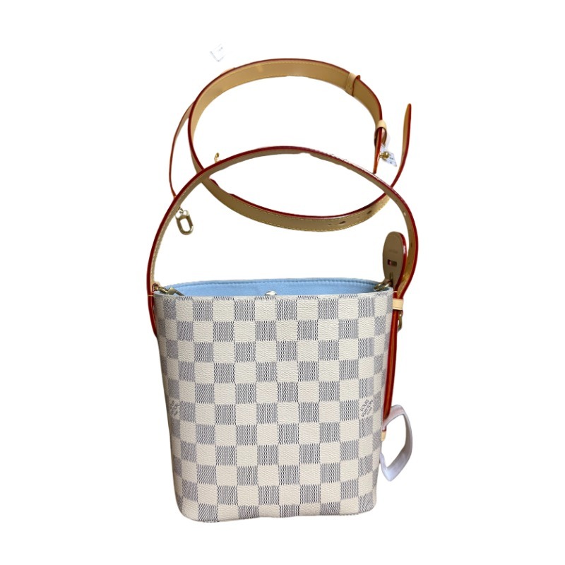 The Louis Vuitton Nano Bucket bag features the brand's classic Damier Azur white checkered canvas, paired with a light blue lining.