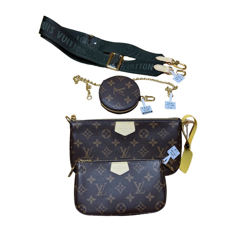 The Louis Vuitton Multi Pochette Accessoires features the brand's classic Monogram canvas, paired with a popular wide green shoulder strap.