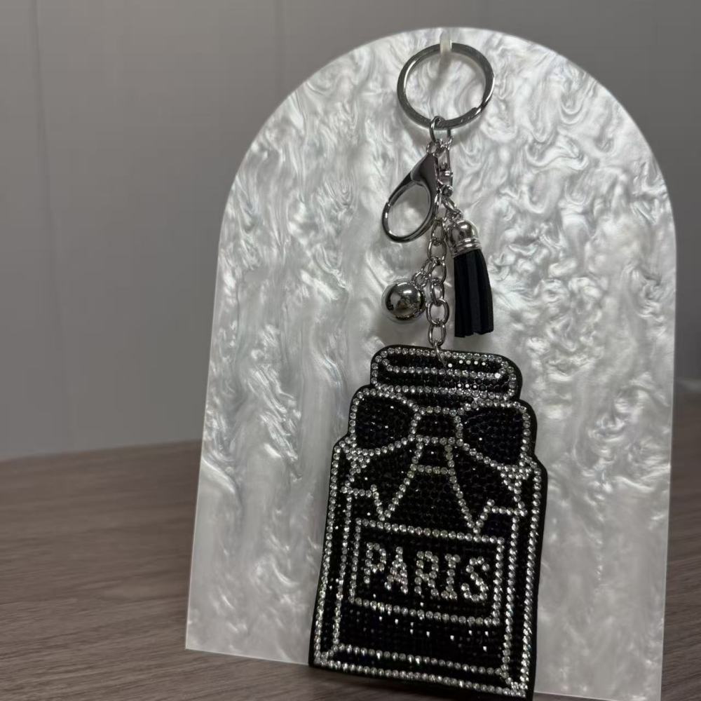 Black perfume keychain