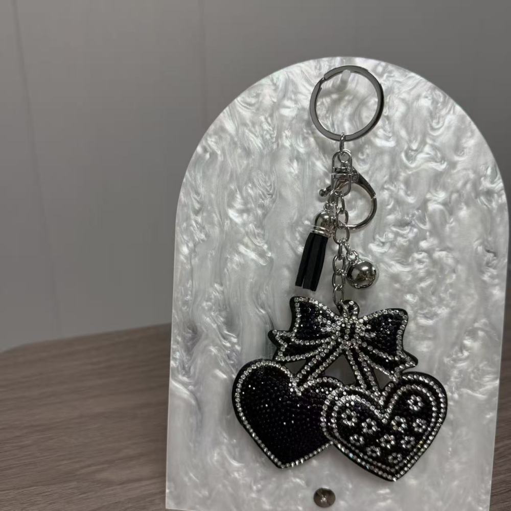 Black heart-shaped cherry keychain