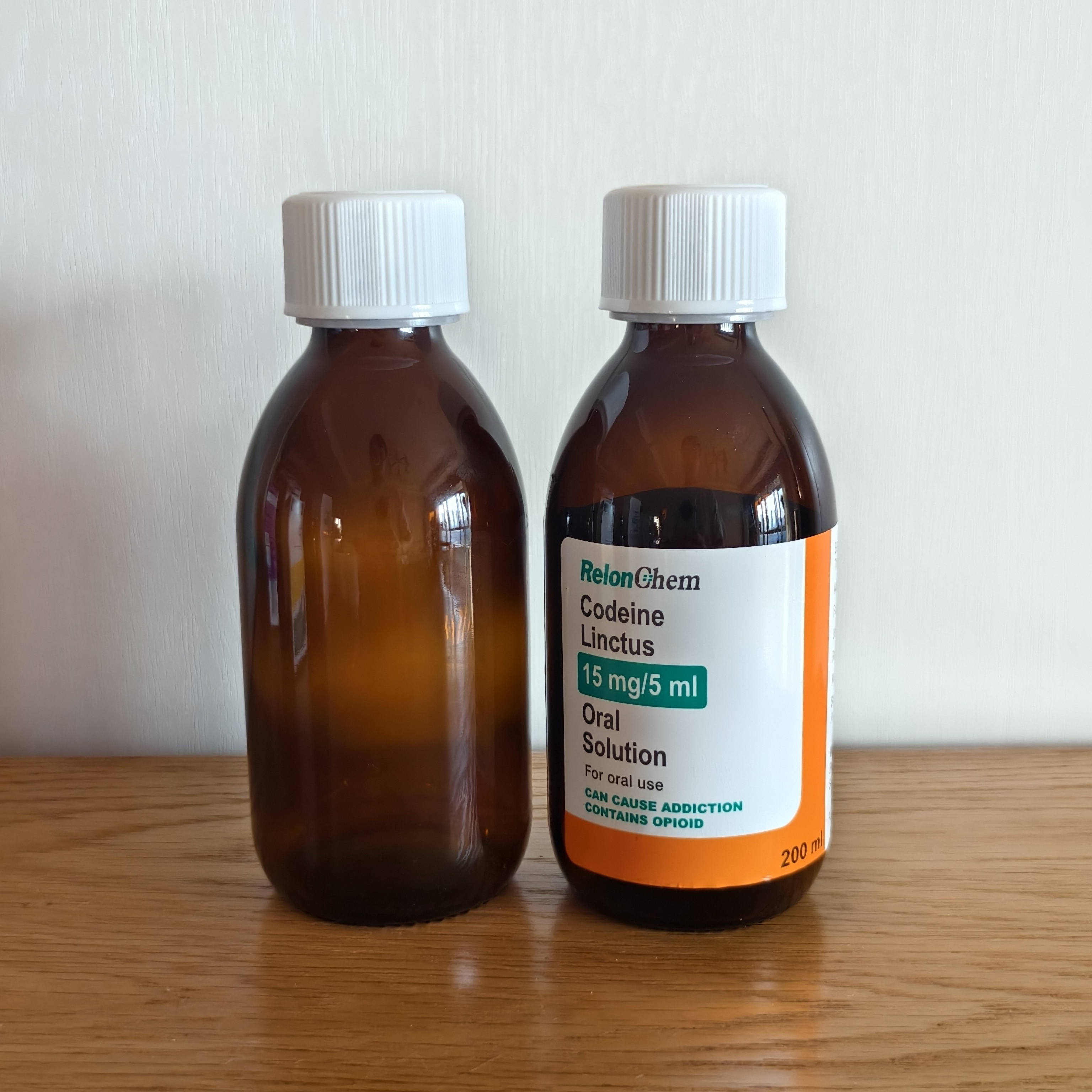 Empty Glass Bottle with Label,Box,and Instructions for Relonchem Linctus Syrup