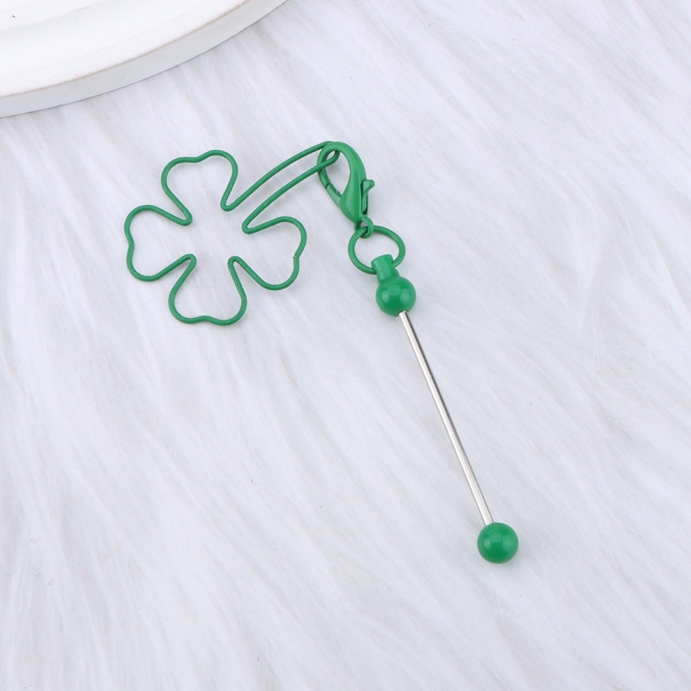 Who gets it?! This DIY four-leaf clover beaded keychain works for phone cases, bags and Christmas trees!