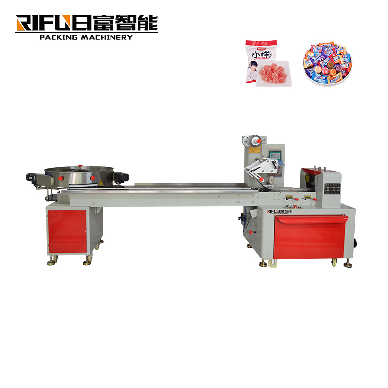 Pillow type heat shrink packing machine