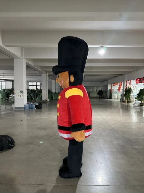 Christmas Festival Walking Inflatable Nutcracker Mascot Costume Cartoon Character Soldier Mascot Suit for Stage Performance