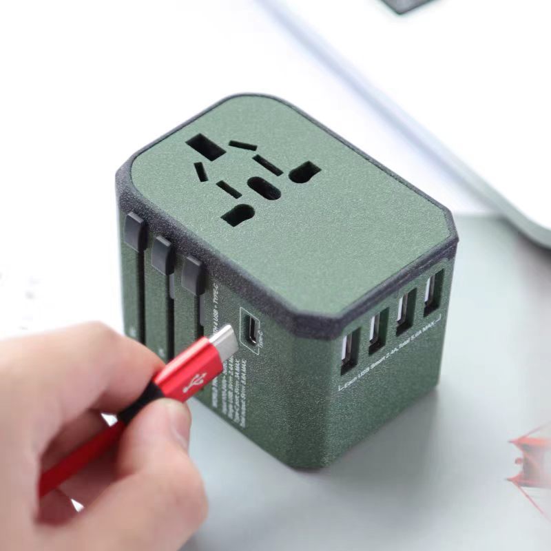 Universal Travel Power Adapter – 4 USB Ports Multi-Device Charger for Global Use