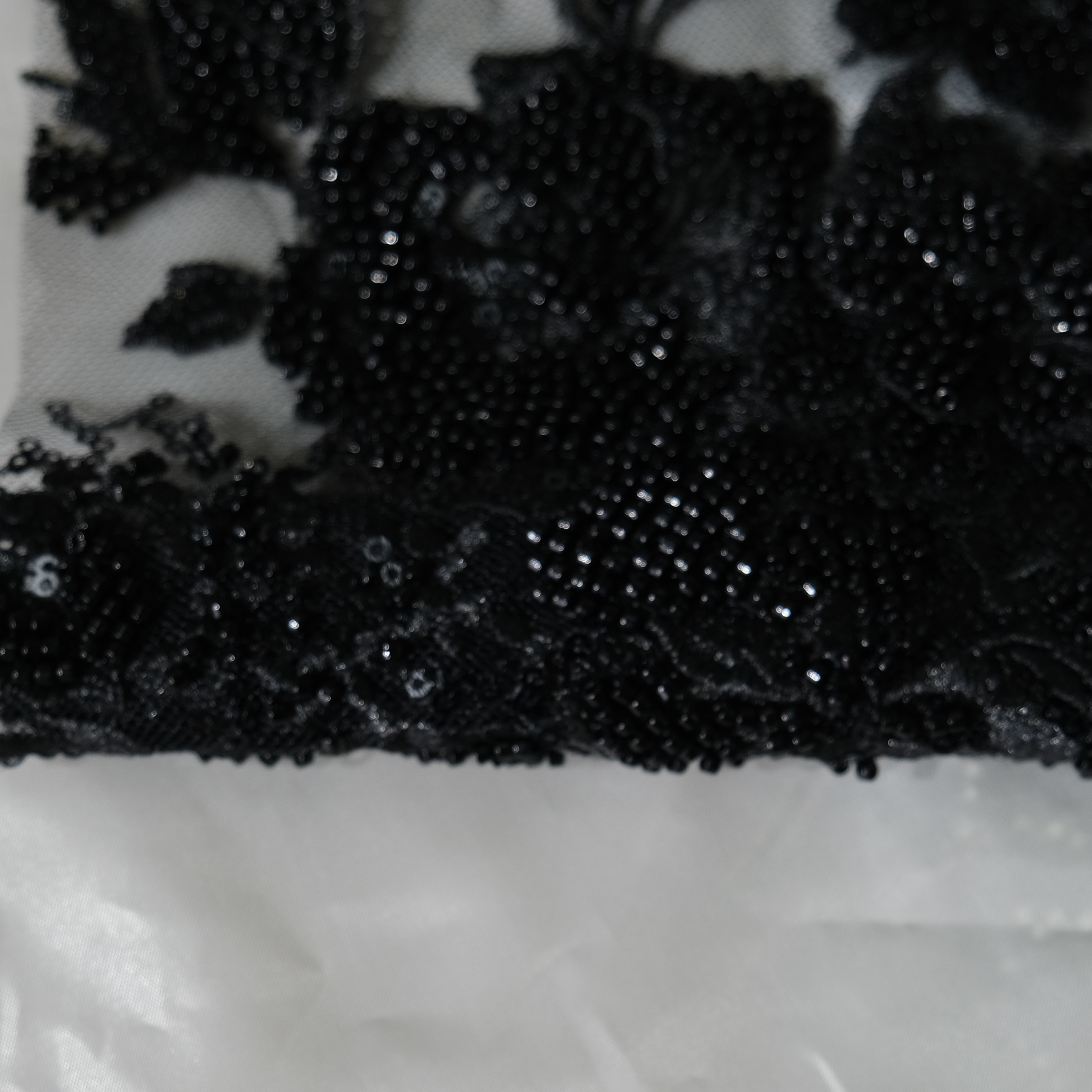 Bouquet Embroidery Fabric in Black color