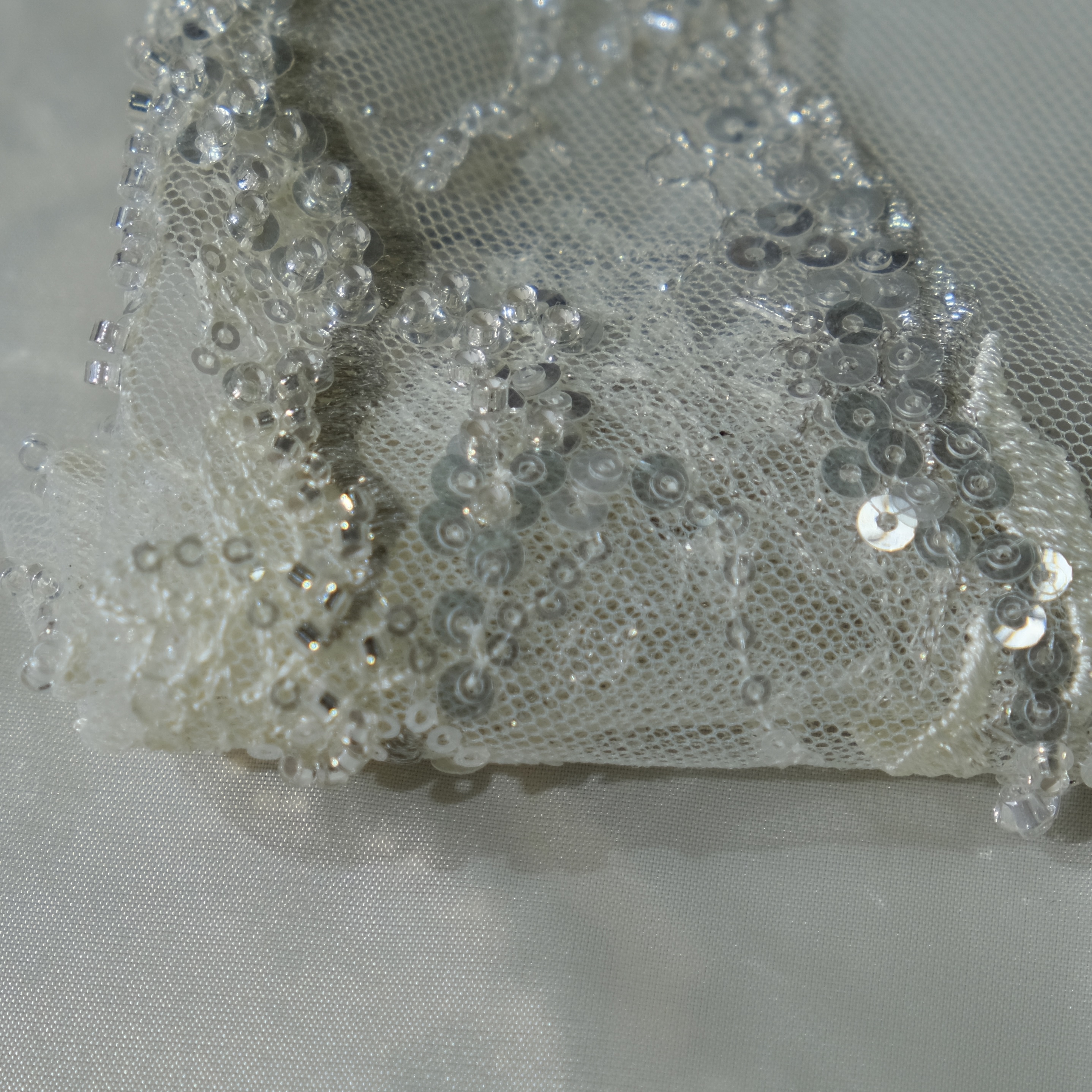 Veinflow Embroidery Fabric in BeigeYellow color