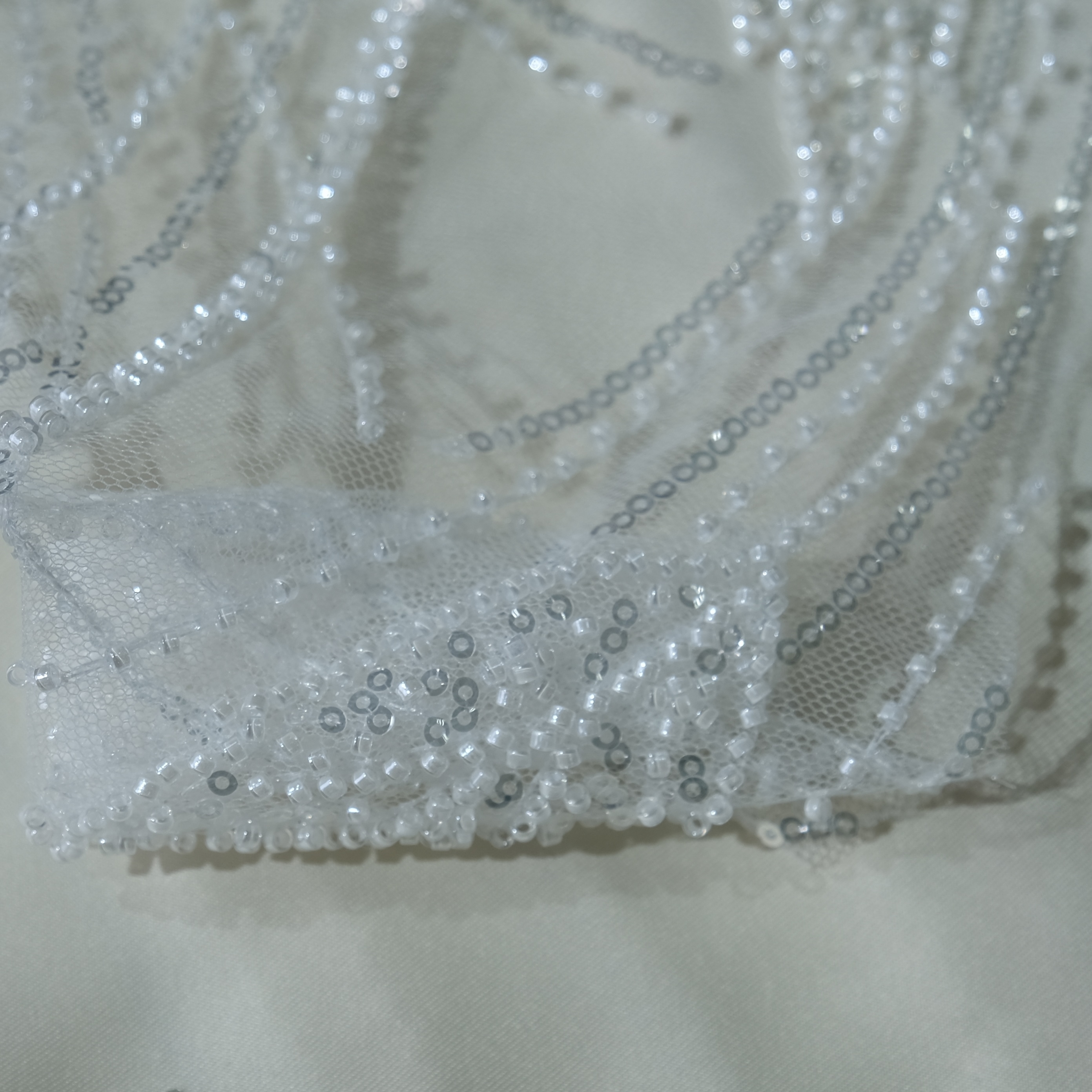 Flowing Leaf Embroidery Fabric in RawWhite color