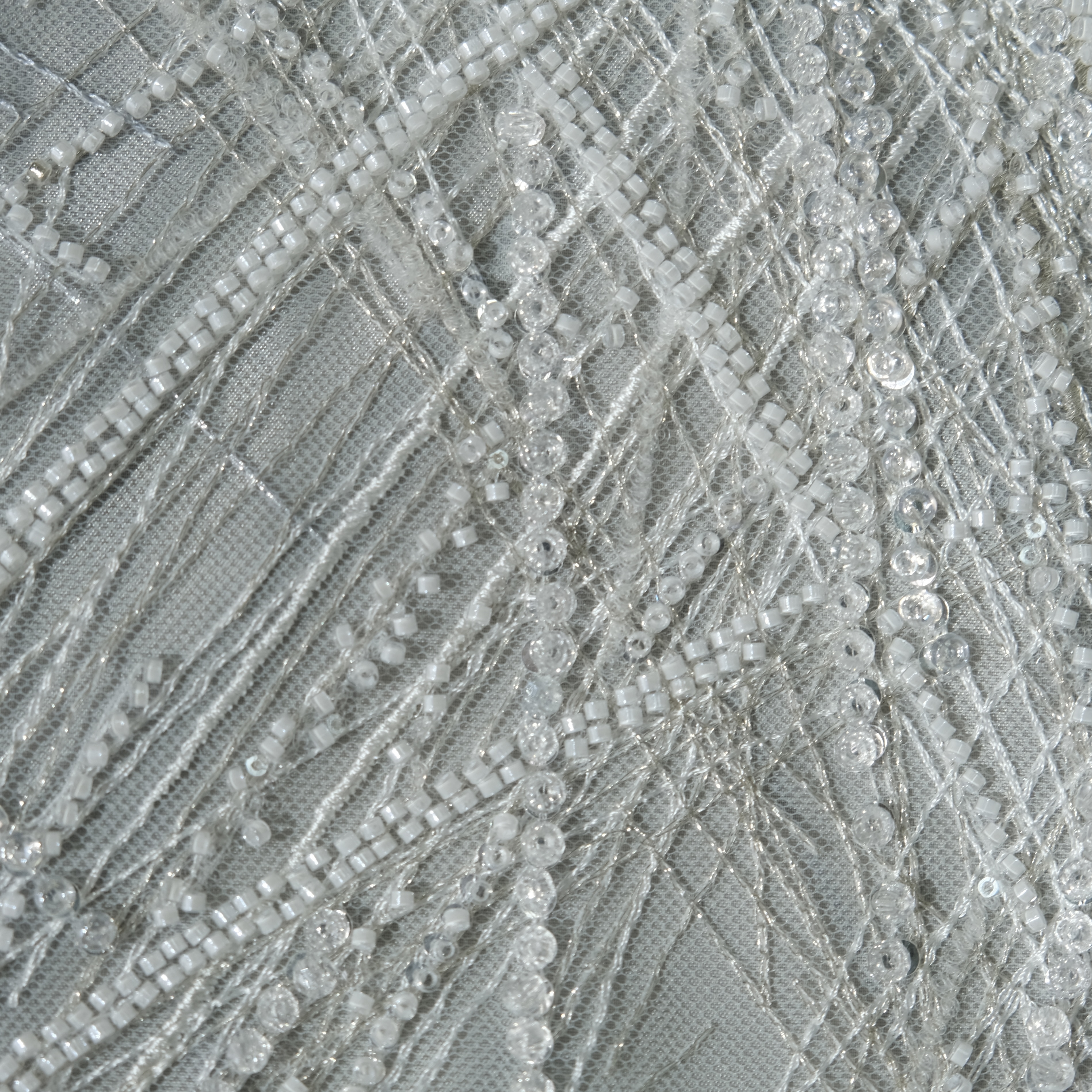 Radiant Burst Embroidery Fabric in RawWhite color